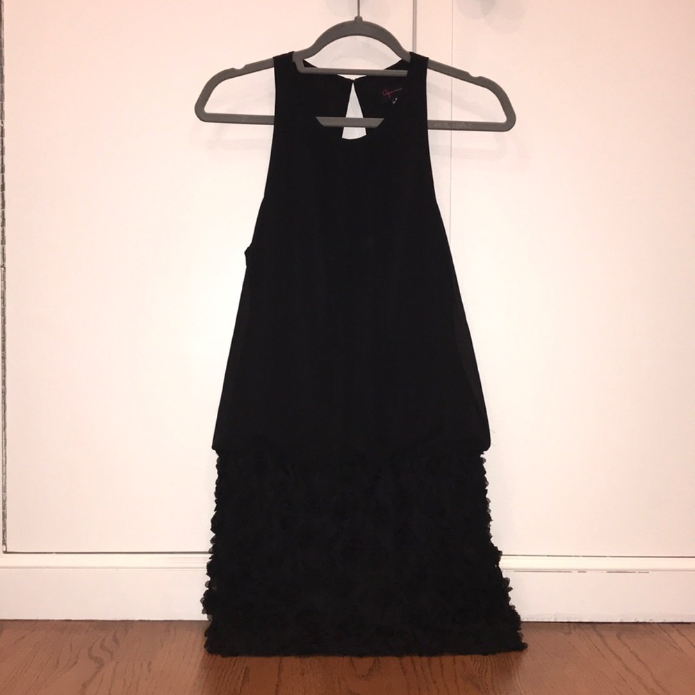 Black sleeveless dress with floral  details